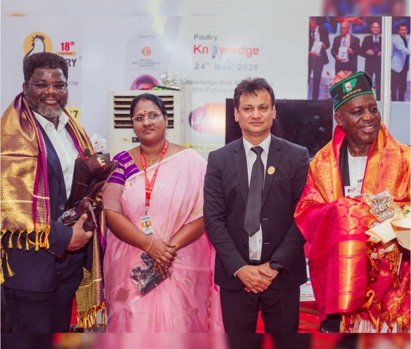 International event participants posing together at an exhibition